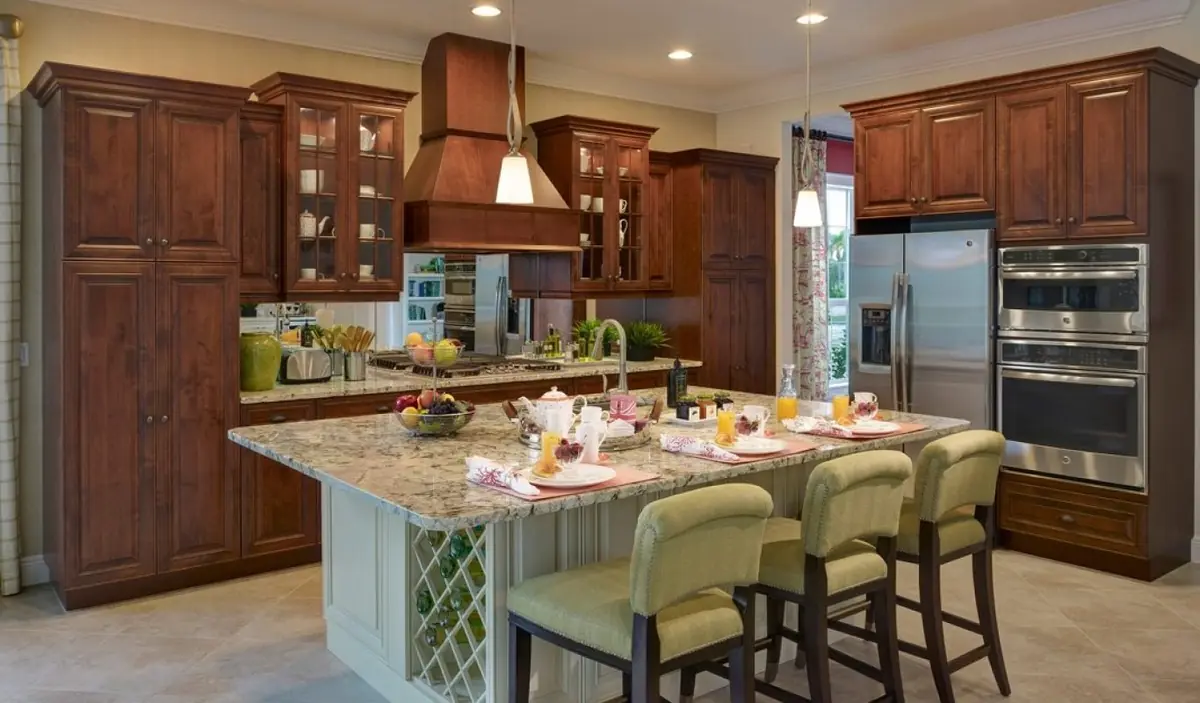 Two Tone Chef’s Kitchen with custom Cabinets and Island with Custom Wine Rack in West Samoset, FL