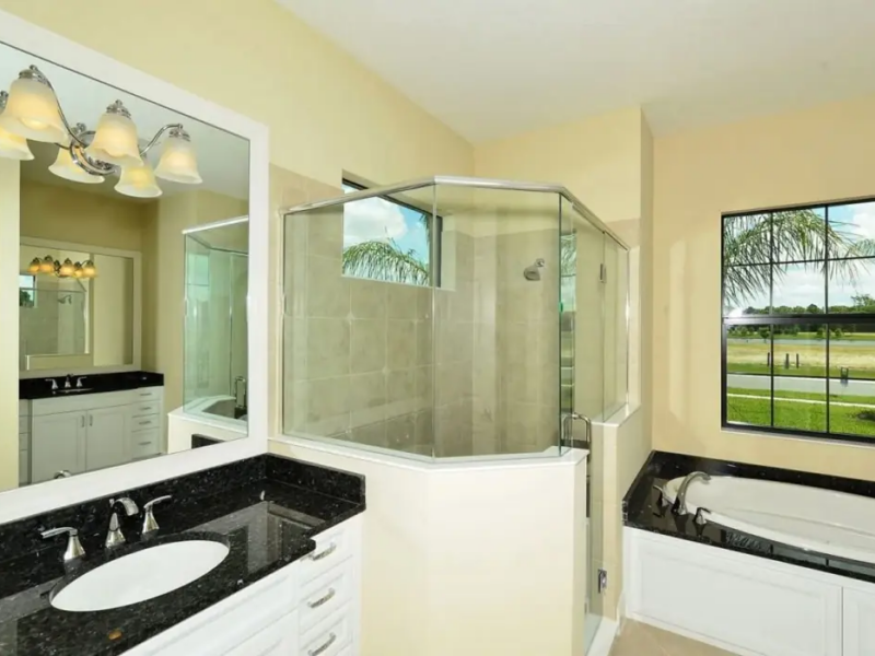 Custom Bathroom with matching mirror frame