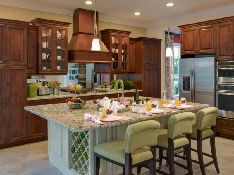 Two Tone Chef&rsquo;s Kitchen with custom Cabinets and Island with Custom Wine Rack