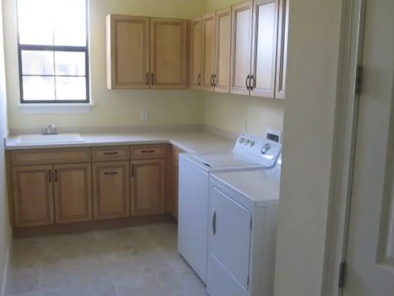 Utility room with custom cabinetry