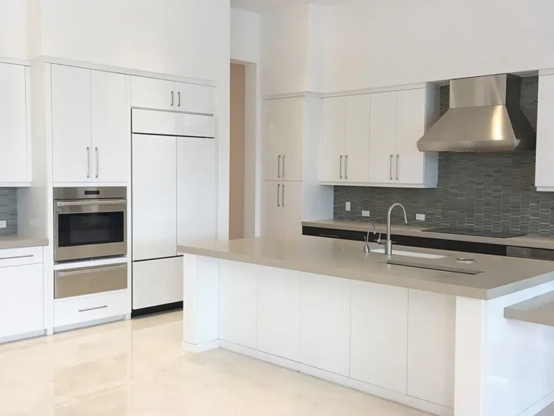 White kitchen cabinetry with island