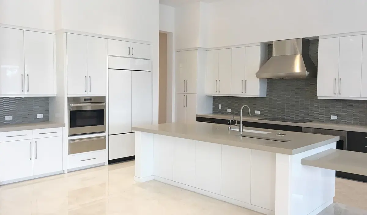 White kitchen cabinetry with island