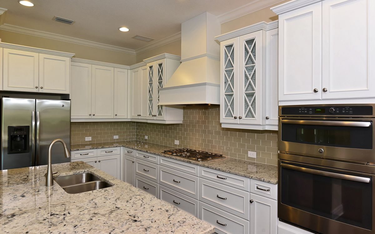 Chef's Kitchen with Traditional Style Cabinets and Triple X Mullions